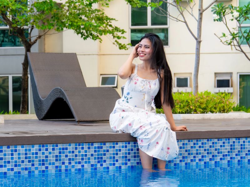 Lady Relaxing by the Pool.webp
